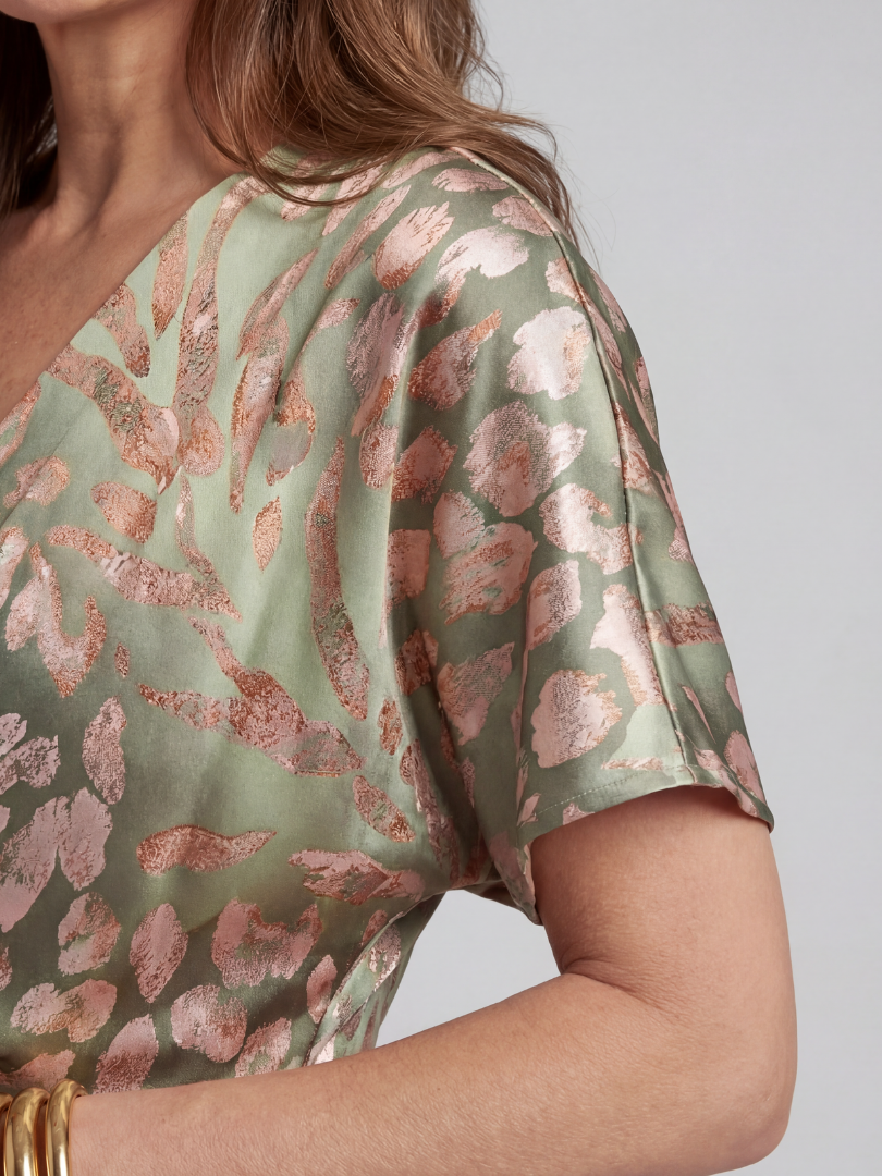 Abstract print midi dress featuring a twist waist and V-neck design, designed for women with fluid drape for a flattering silhouette. 3