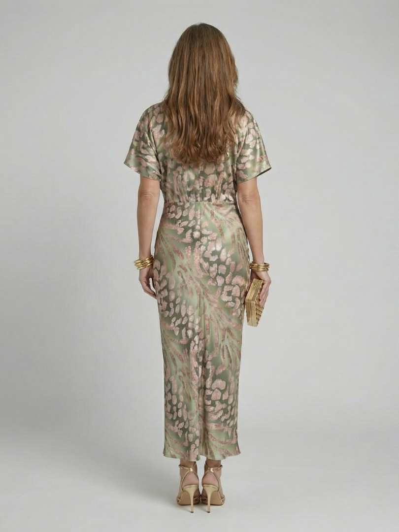Abstract print midi dress featuring a twist waist and V-neck design, designed for women with fluid drape for a flattering silhouette. 4