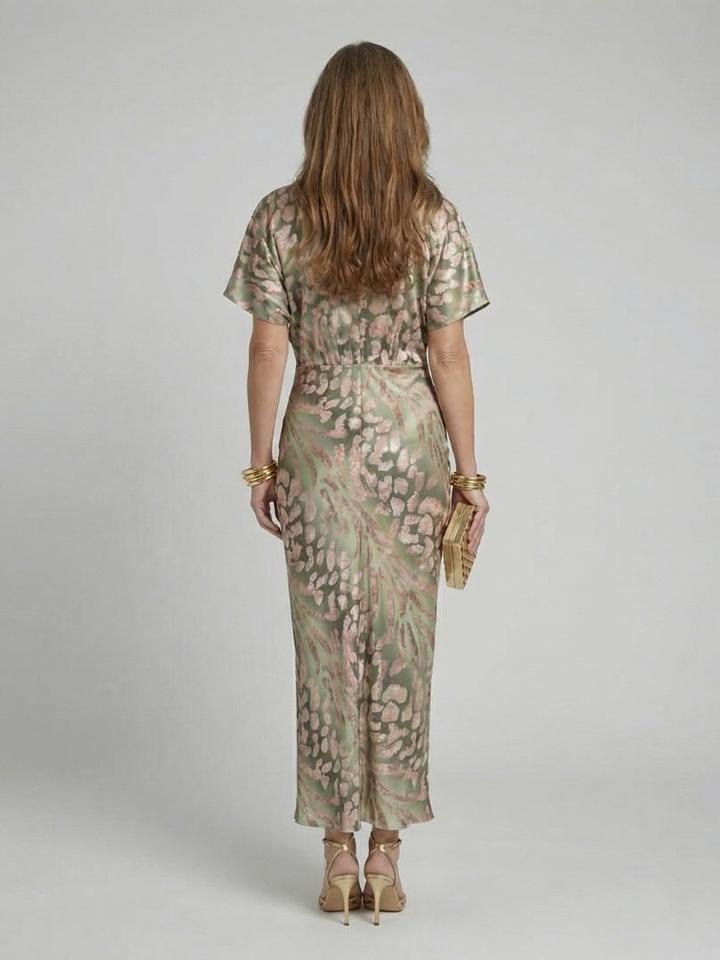 Abstract print midi dress featuring a twist waist and V-neck design, designed for women with fluid drape for a flattering silhouette. 4