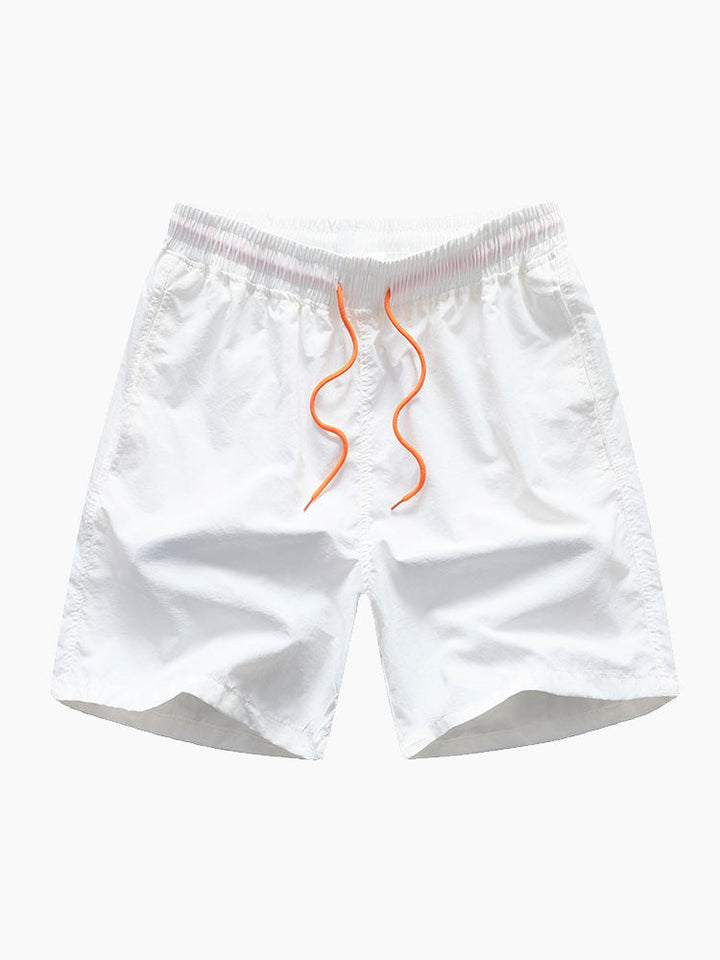 Lightweight polyester beachwear set featuring a vibrant palm tree and flamingo print, includes a stylish shirt and comfortable nylon swim shorts, perfect for summer days 7