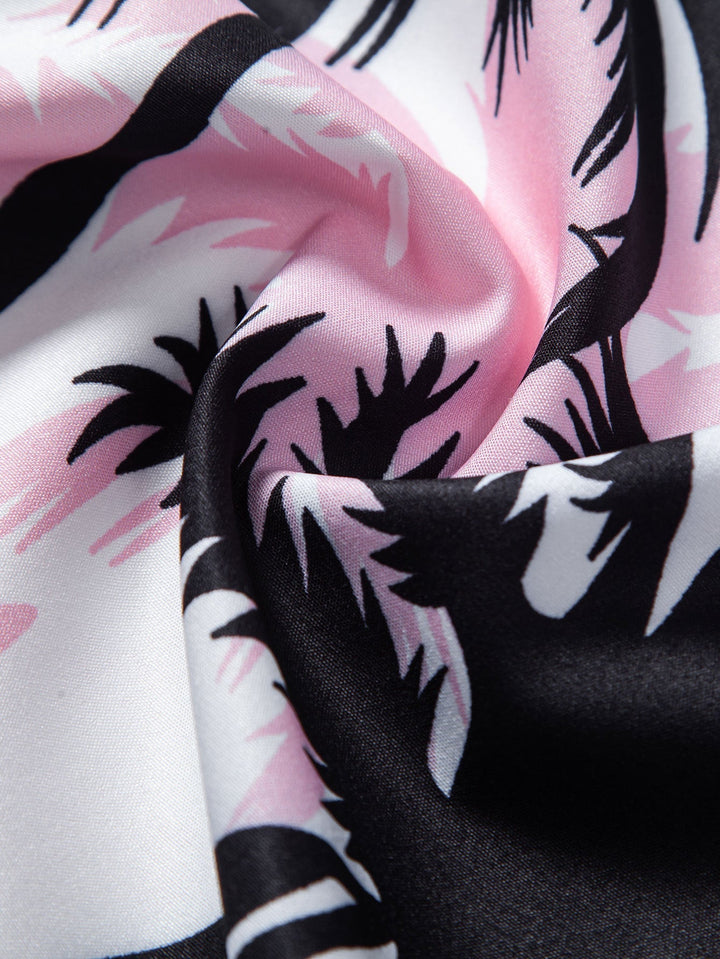 Beachwear set featuring a unique palm tree print, designed for comfort with a regular fit, includes a 100% polyester shirt and 100% nylon 8
