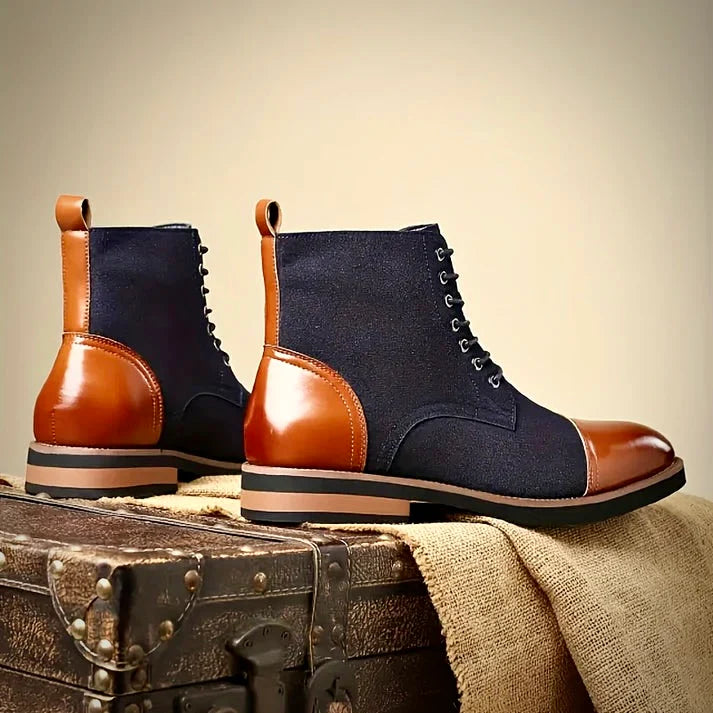 Black leather Oxford boots featuring a cushioned insole and closed-lacing design, perfect for stylish men's footwear. 2