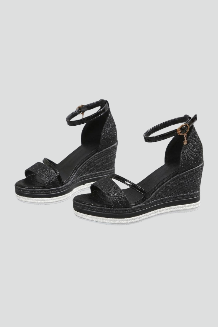 Black wedge sandals for women featuring an adjustable ankle strap, glitter open-toe design, and woven espadrille wedges, perfect for stylish summer outfits. 2