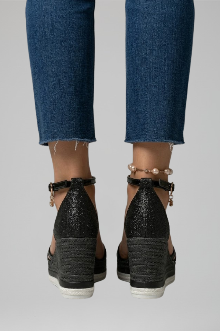 Black wedge sandals for women featuring an adjustable ankle strap, glitter open-toe design, and woven espadrille wedges, perfect for stylish summer outfits. 4