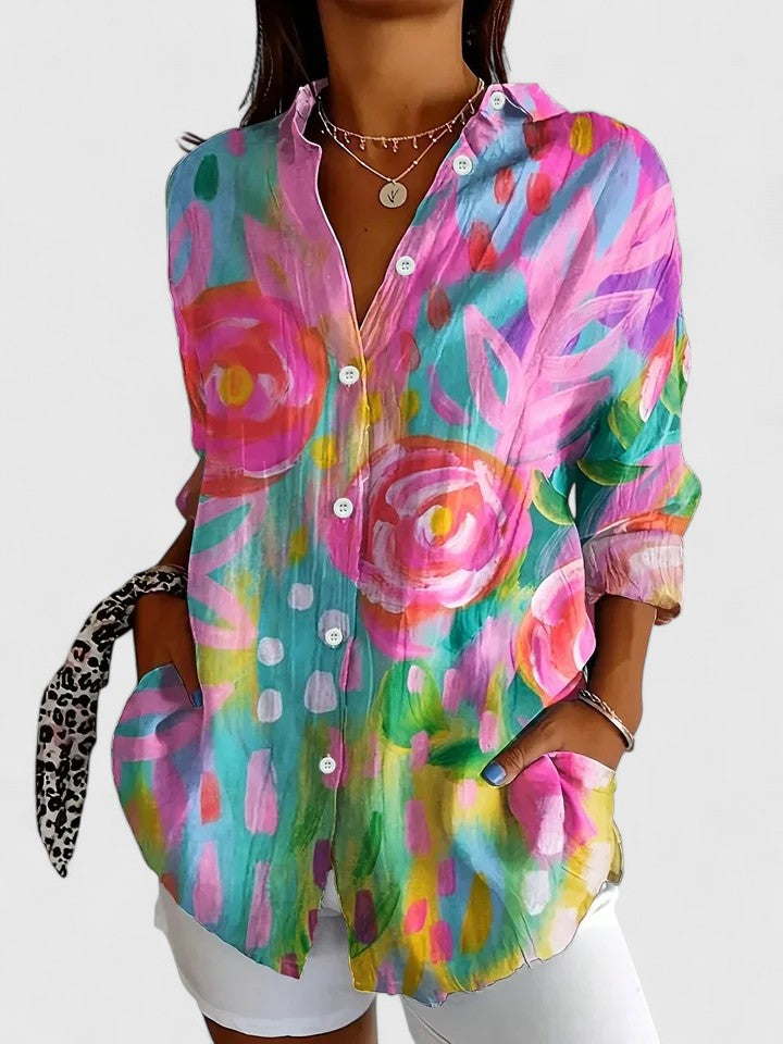 Button-up blouse featuring a vibrant multicolor artistic print, crafted from a relaxed fit cotton blend for comfortable everyday wear. 0
