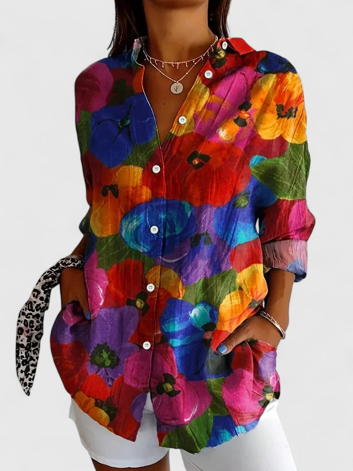 Button-up blouse featuring a vibrant multicolor artistic print, crafted from a relaxed fit cotton blend for comfortable everyday wear. 2