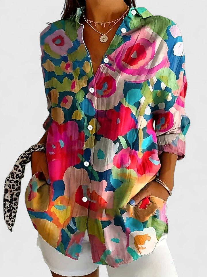 Button-up blouse featuring a vibrant multicolor artistic print, crafted from a relaxed fit cotton blend for comfortable everyday wear. 3