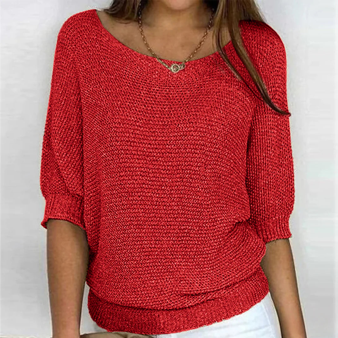 Elegant women's cable knit sweater made from soft knit fabric, featuring a versatile design suitable for all seasons. 2