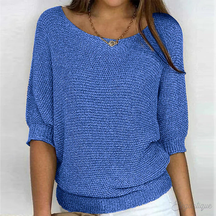 Elegant women's cable knit sweater made from soft knit fabric, featuring a versatile design suitable for all seasons. 5