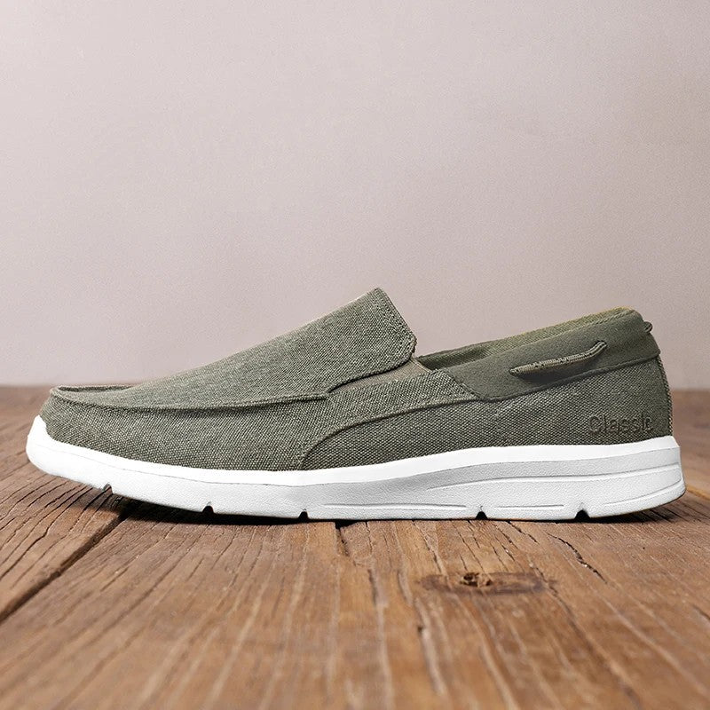 Canvas loafers for women featuring a breathable upper and lightweight sole, designed for casual slip-on comfort. 1