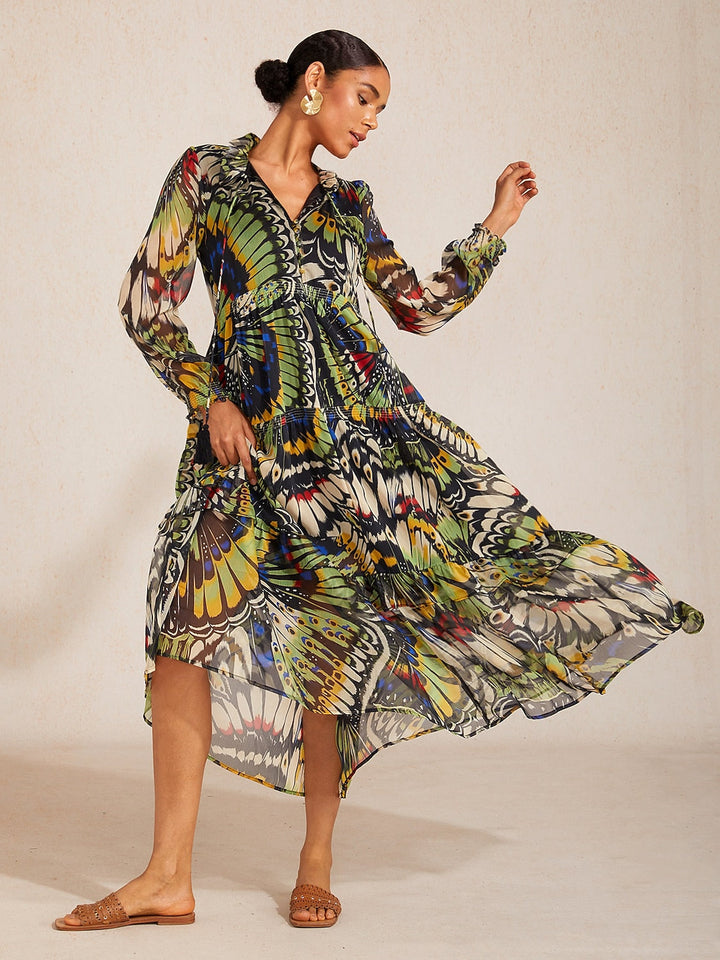 Chiffon maxi dress featuring a ruffle collar and vibrant butterfly print, designed for women seeking a flowing and elegant long dress. 0