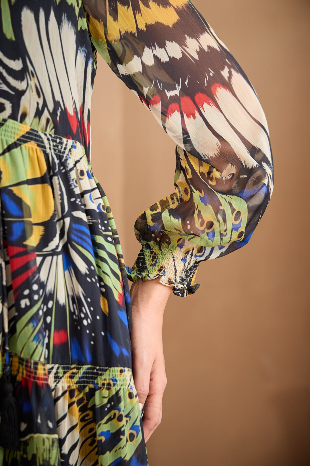 Chiffon maxi dress featuring a ruffle collar and vibrant butterfly print, designed for women seeking a flowing and elegant long dress. 3