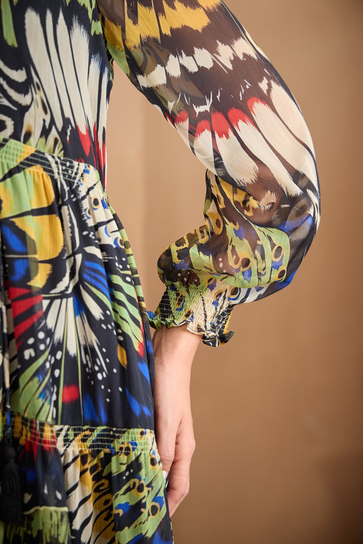 Chiffon maxi dress featuring a ruffle collar and vibrant butterfly print, designed for women seeking a flowing and elegant long dress. 3