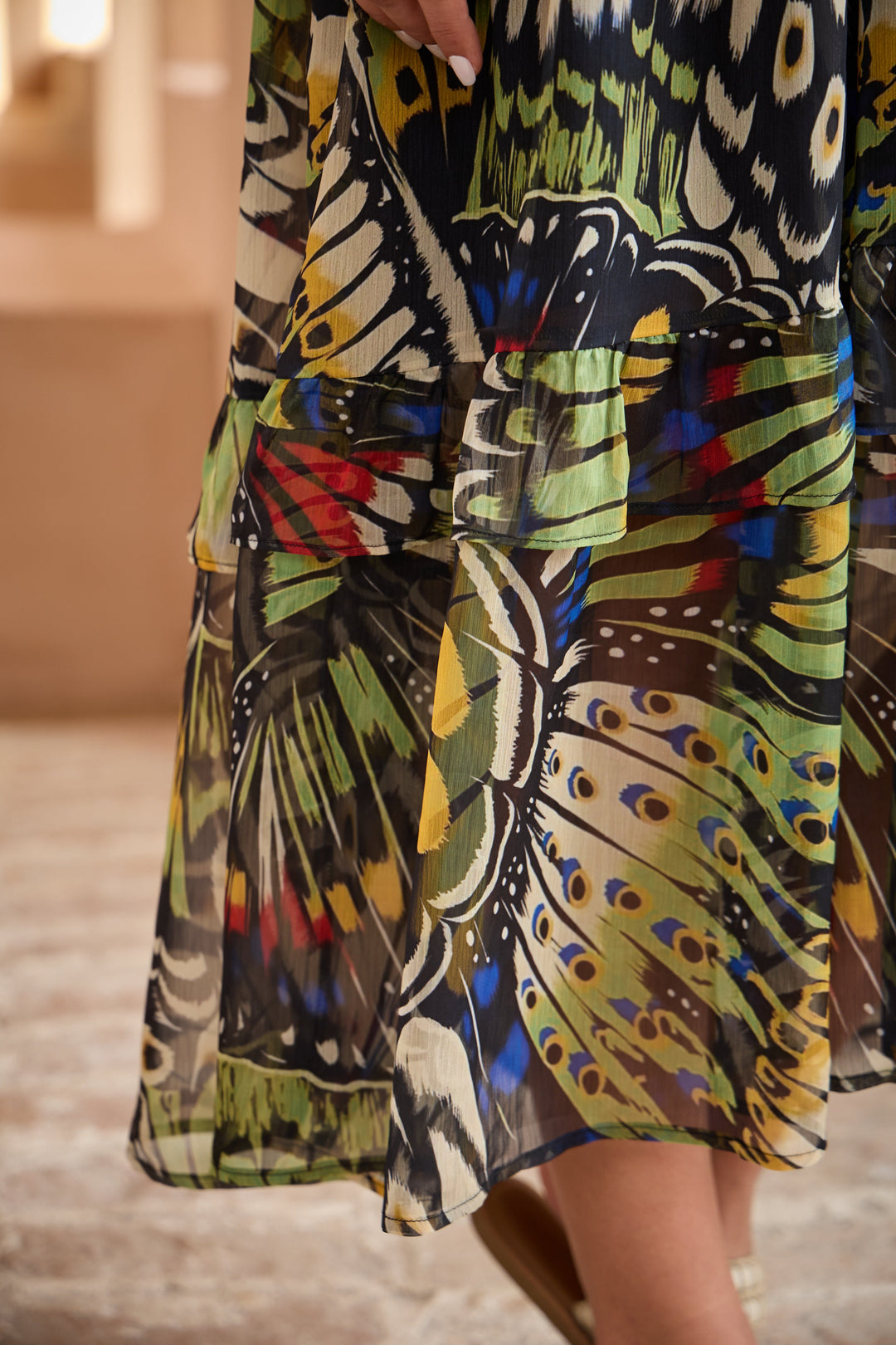 Chiffon maxi dress featuring a ruffle collar and vibrant butterfly print, designed for women seeking a flowing and elegant long dress. 4