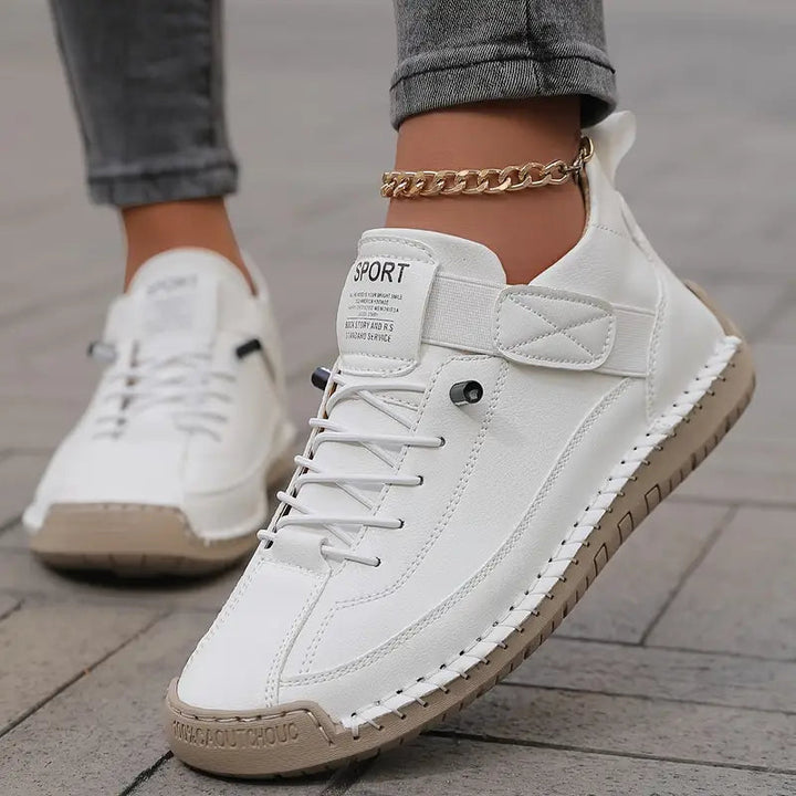 Comfort Support Sneakers featuring breathable leather, shock absorption technology, and an easy on/off design for ultimate comfort and convenience. 0