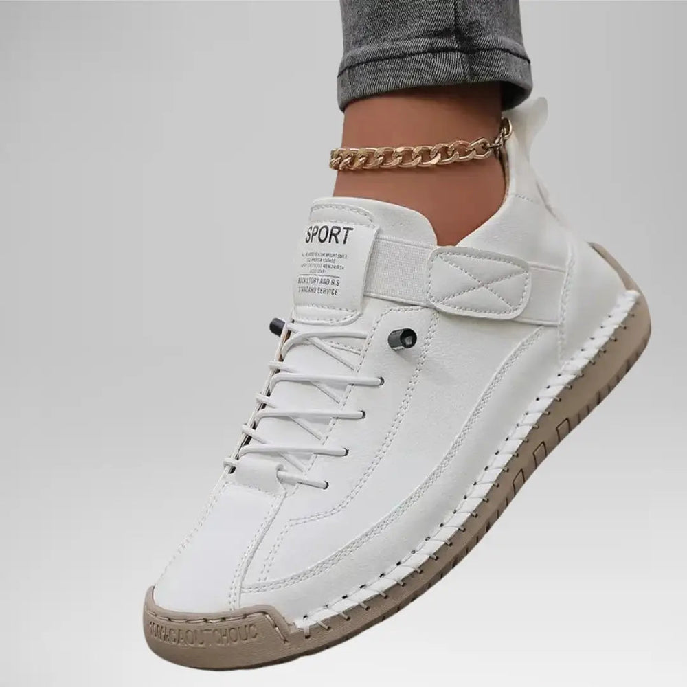 Comfort Support Sneakers featuring breathable leather, shock absorption technology, and an easy on/off design for ultimate comfort and convenience. 1