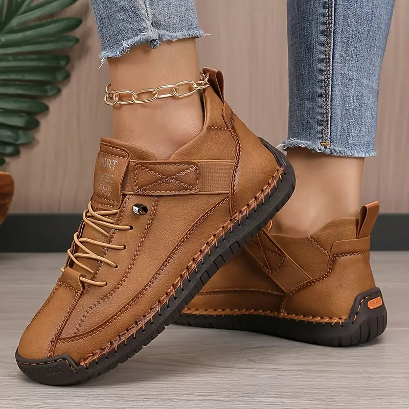 Comfort Support Sneakers featuring breathable leather, shock absorption technology, and an easy on/off design for ultimate comfort and convenience. 3