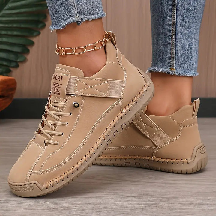 Comfort Support Sneakers featuring breathable leather, shock absorption technology, and an easy on/off design for ultimate comfort and convenience. 6