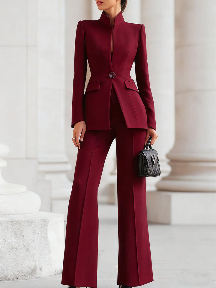Elegant blazer and trouser suit set featuring a tailored fit and elongated silhouette, perfect for professional and formal occasions. 3