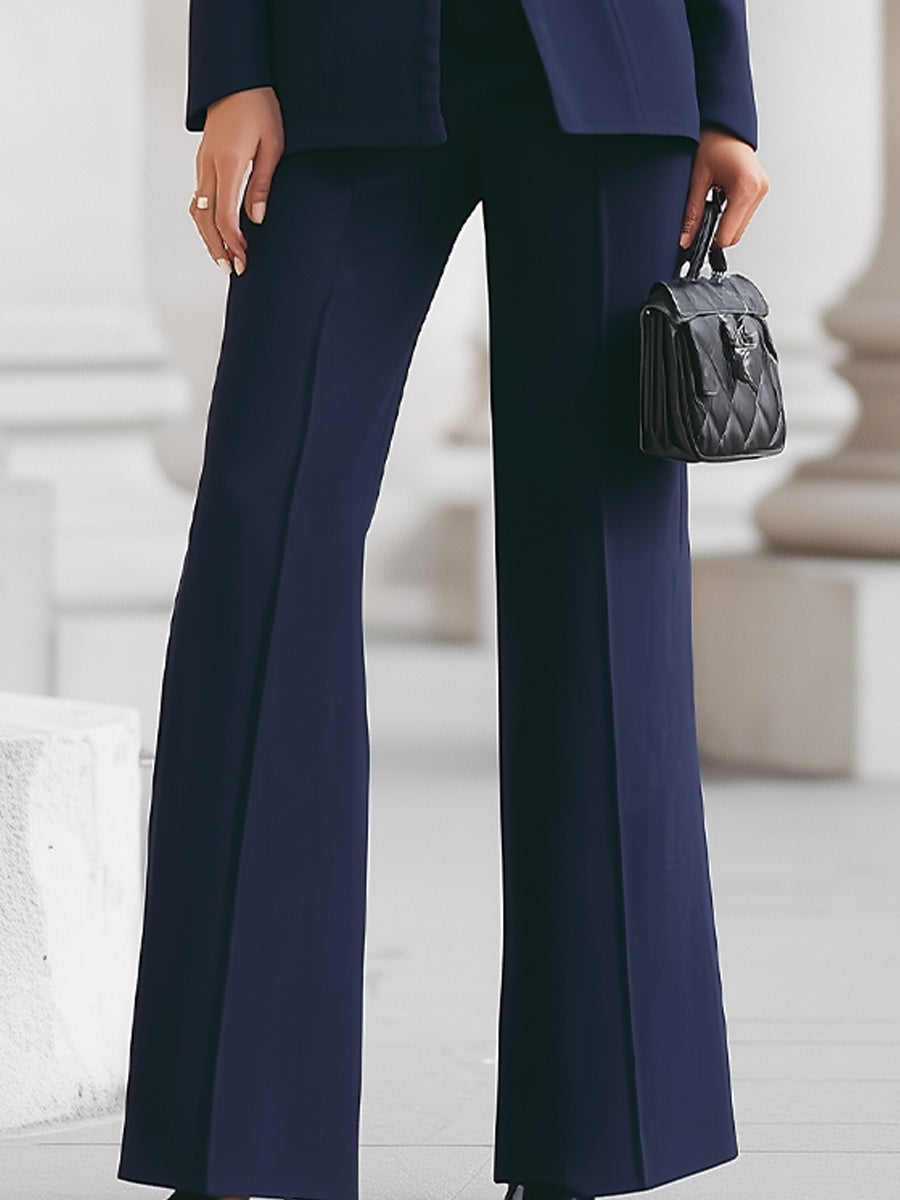 Elegant blazer and trouser suit set featuring a tailored fit and timeless silhouette, perfect for professional and formal occasions. 6