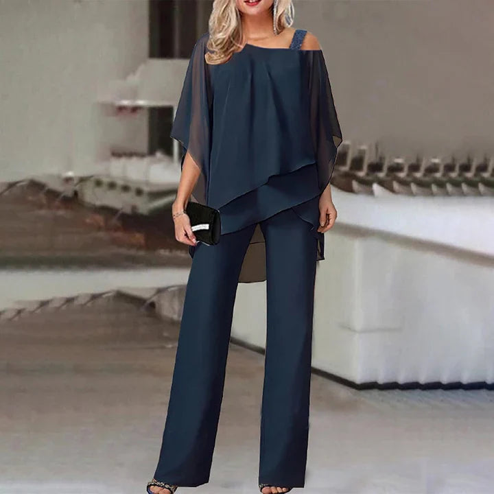 Elegant women's two-piece outfit featuring a flowy overlay top and wide-leg trousers, designed for comfort and style, perfect for all occasions. 5