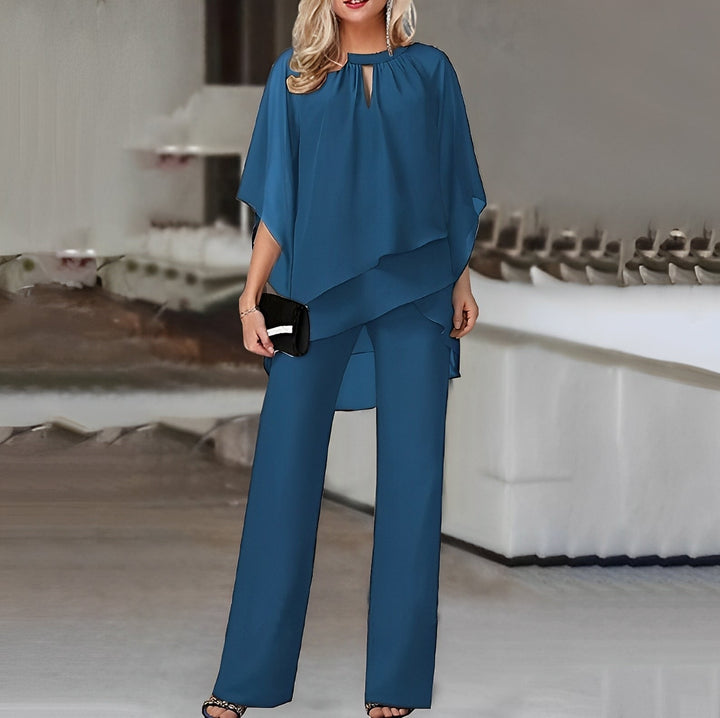 Elegant women's two-piece outfit featuring a flowy overlay top and wide-leg trousers, designed for comfort and style, perfect for all occasions. 7