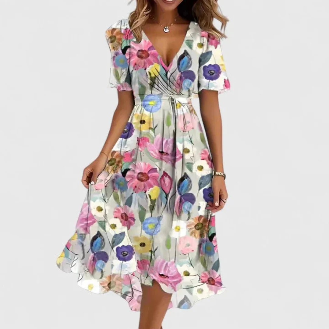 Floral midi dress featuring a V-neckline, elegant flowing fit, perfect for wedding guests or formal occasions. 1