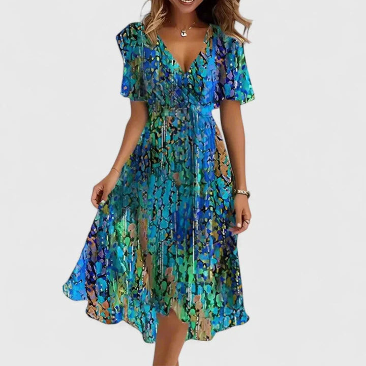 Floral midi dress featuring a V-neckline, elegant flowing fit, perfect for wedding guests or formal occasions. 3