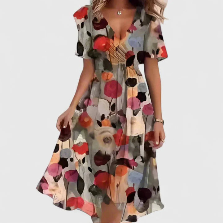 Floral midi dress featuring a V-neckline, elegant flowing fit, perfect for wedding guests or formal occasions. 4
