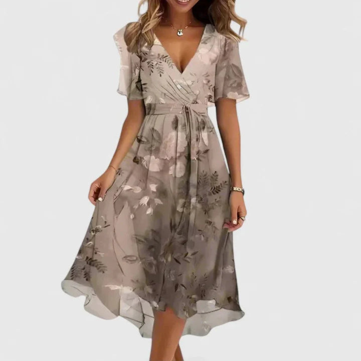 Floral midi dress featuring a V-neckline, elegant flowing fit, perfect for wedding guests or formal occasions. 5