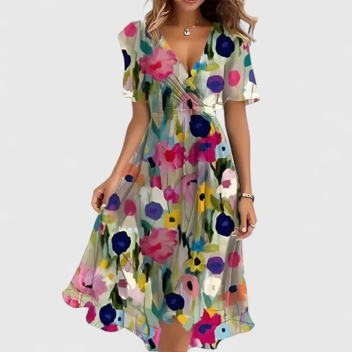 Floral midi dress featuring a V-neckline, elegant flowing fit, perfect for wedding guests or formal occasions. 7