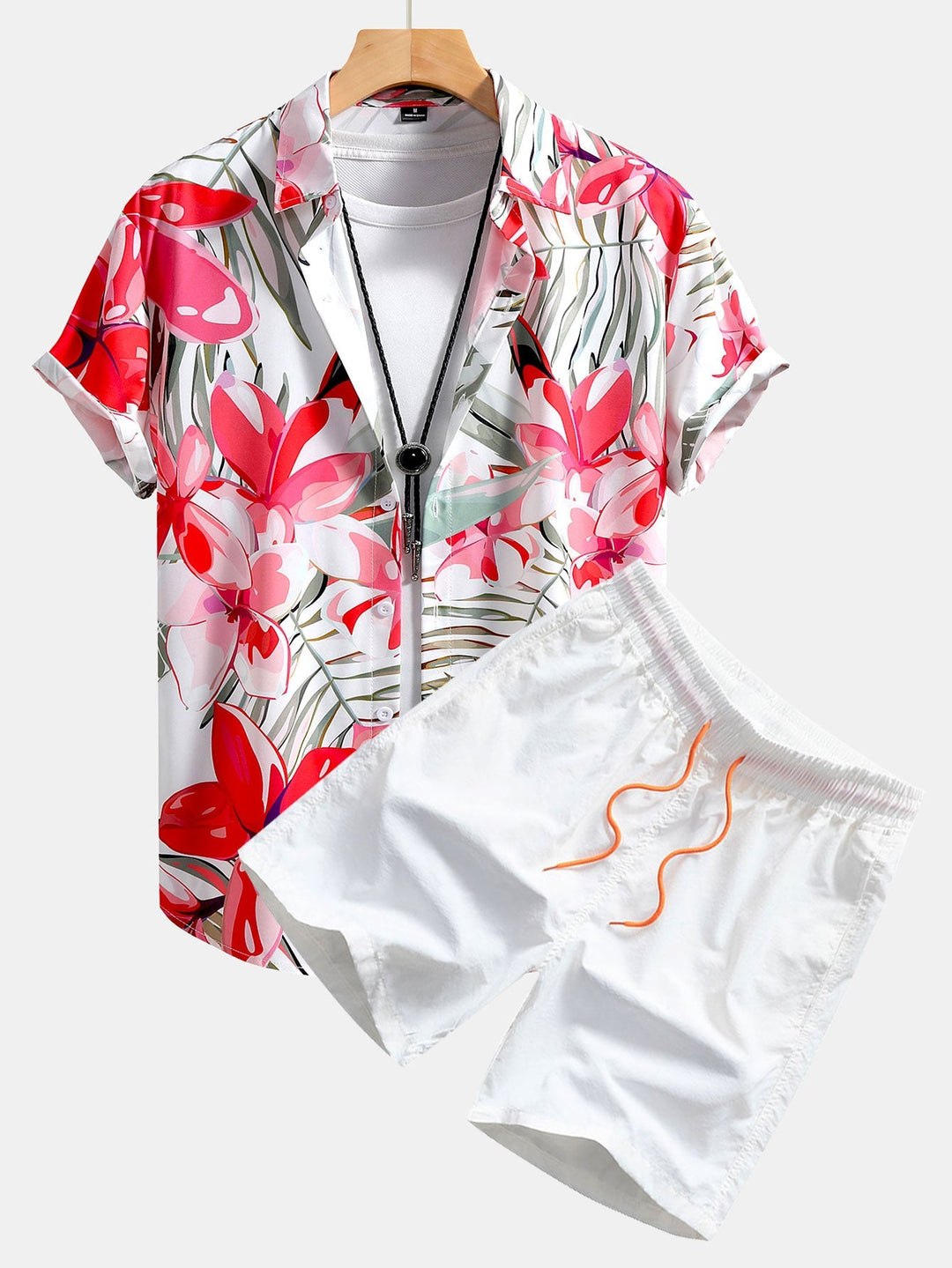 Floral print shirt and swim shorts set in a comfortable regular fit, made from 100% polyester and nylon for a stylish summer look. 1