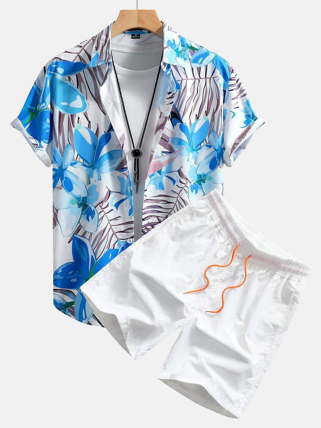 Floral print shirt and swim shorts set in a comfortable regular fit, made from 100% polyester and nylon for a stylish summer look. 3