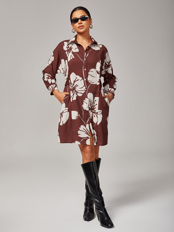 Floral shirt dress featuring a button-down front and raglan sleeves, designed in a brown rayon fabric, perfect for summer wear for women. 2