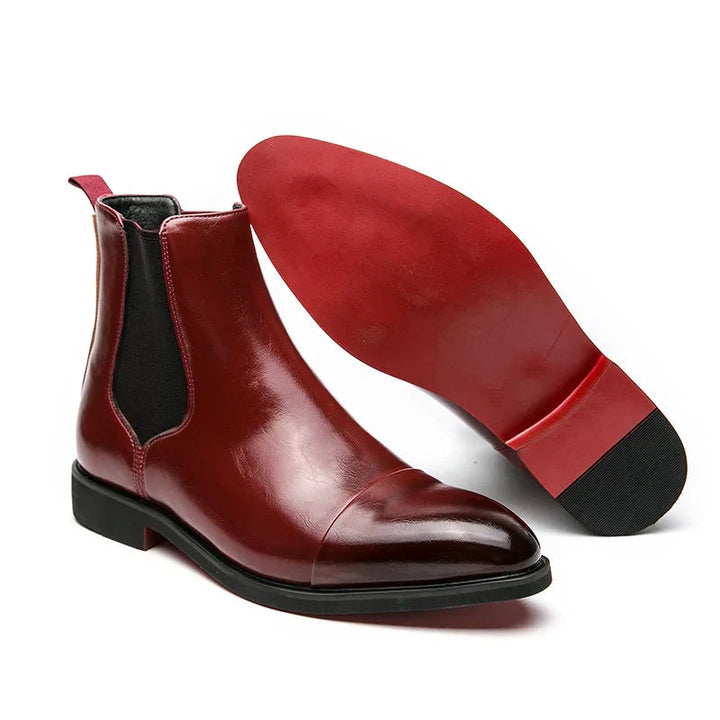 Genuine leather Chelsea boots for men and women in classic black design, offering timeless comfort and style for any occasion. 1