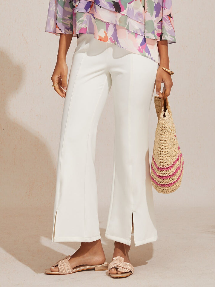 High-waist cropped flared pants for women featuring a stylish split detail, made from soft stretch fabric for comfort and versatility. 0