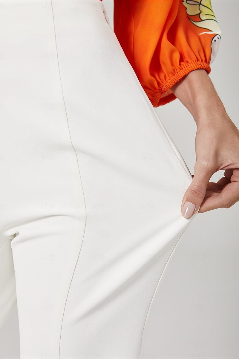 High-waist cropped flared pants for women featuring a stylish split detail, made from soft stretch fabric for comfort and versatility. 1