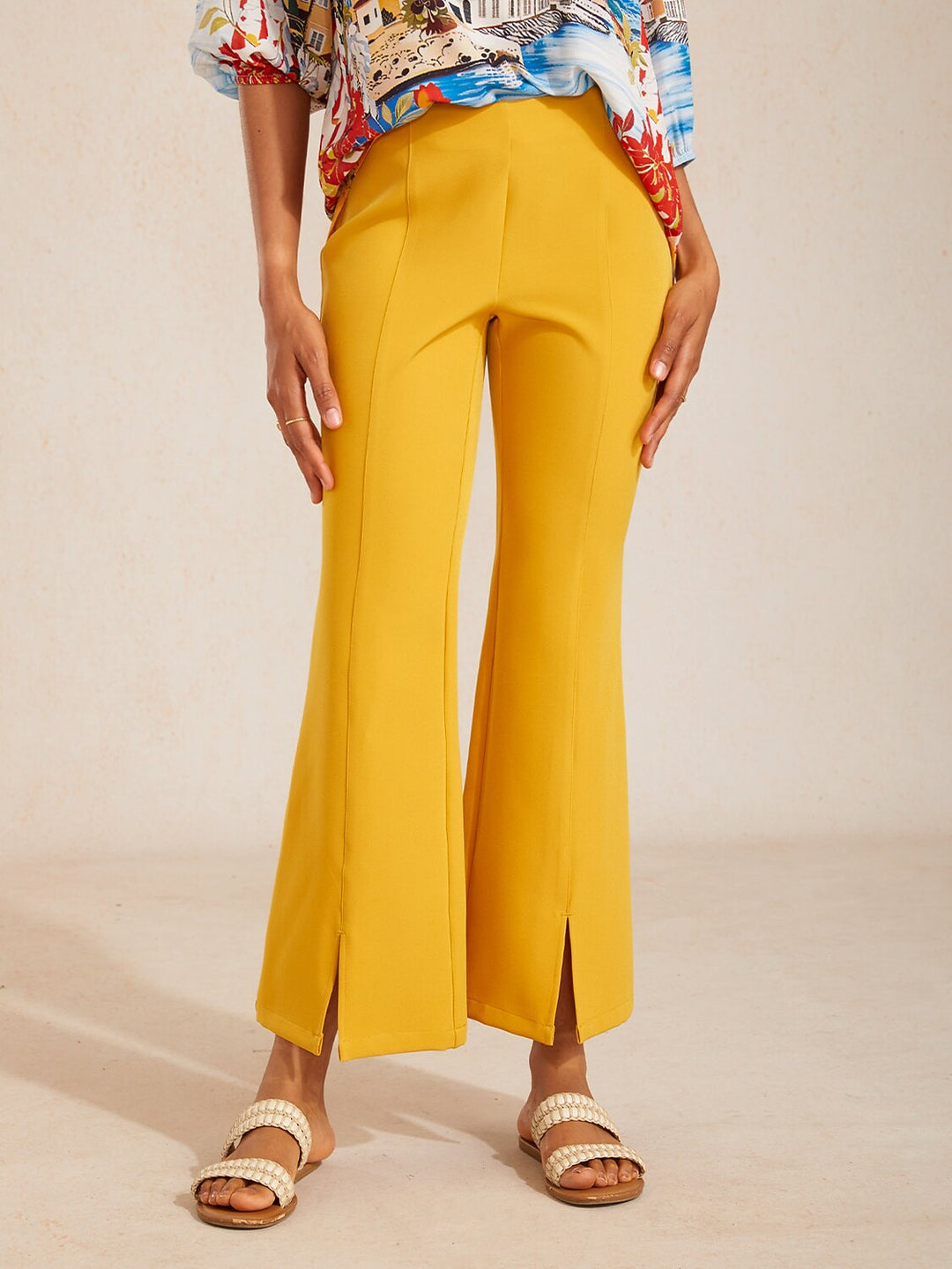 High-waist cropped flared pants for women featuring a stylish split detail, made from soft stretch fabric for comfort and versatility. 10