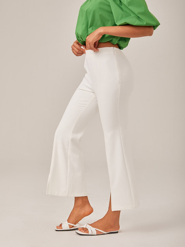 High-waist cropped flared pants for women featuring a stylish split detail, made from soft stretch fabric for comfort and versatility. 2