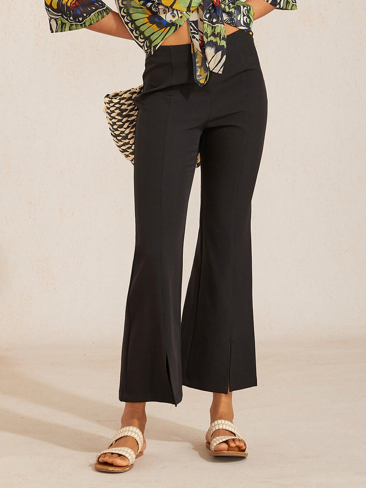 High-waist cropped flared pants for women featuring a stylish split detail, made from soft stretch fabric for comfort and versatility. 6