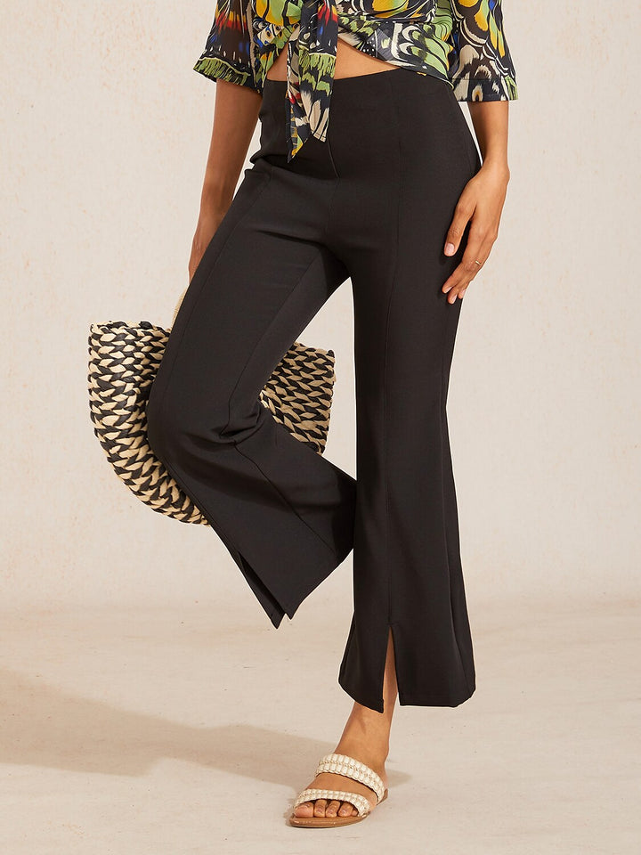 High-waist cropped flared pants for women featuring a stylish split detail, made from soft stretch fabric for comfort and versatility. 7
