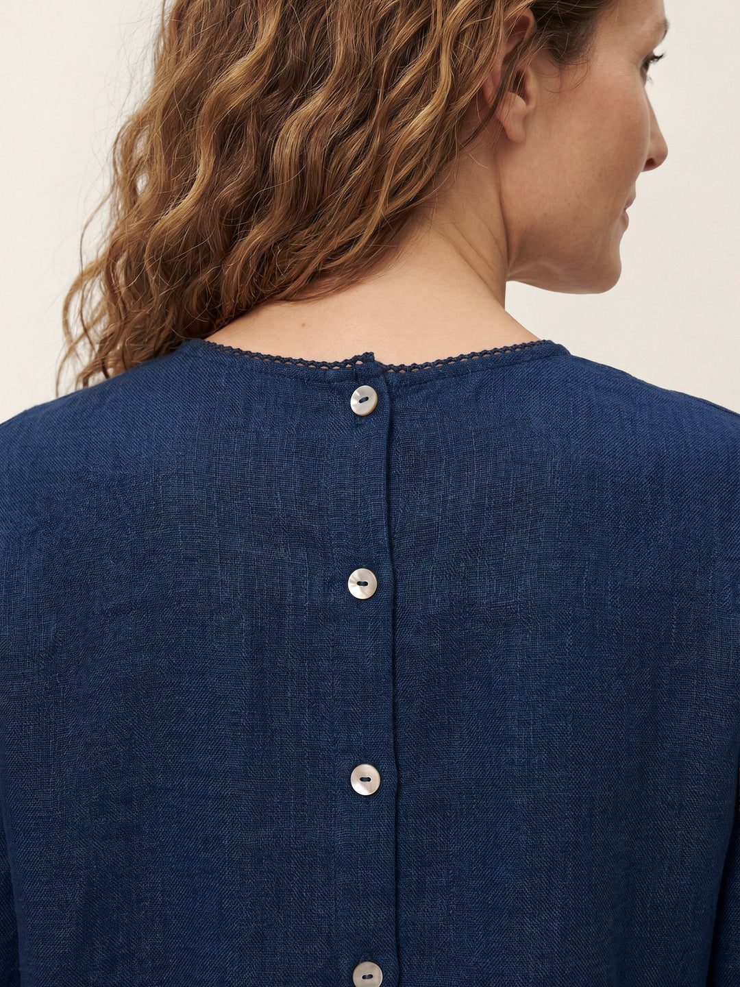 Elegant linen blend blouse featuring pintuck details and delicate lace trim, designed with short sleeves and a round neck for a stylish and comfortable fit. 6