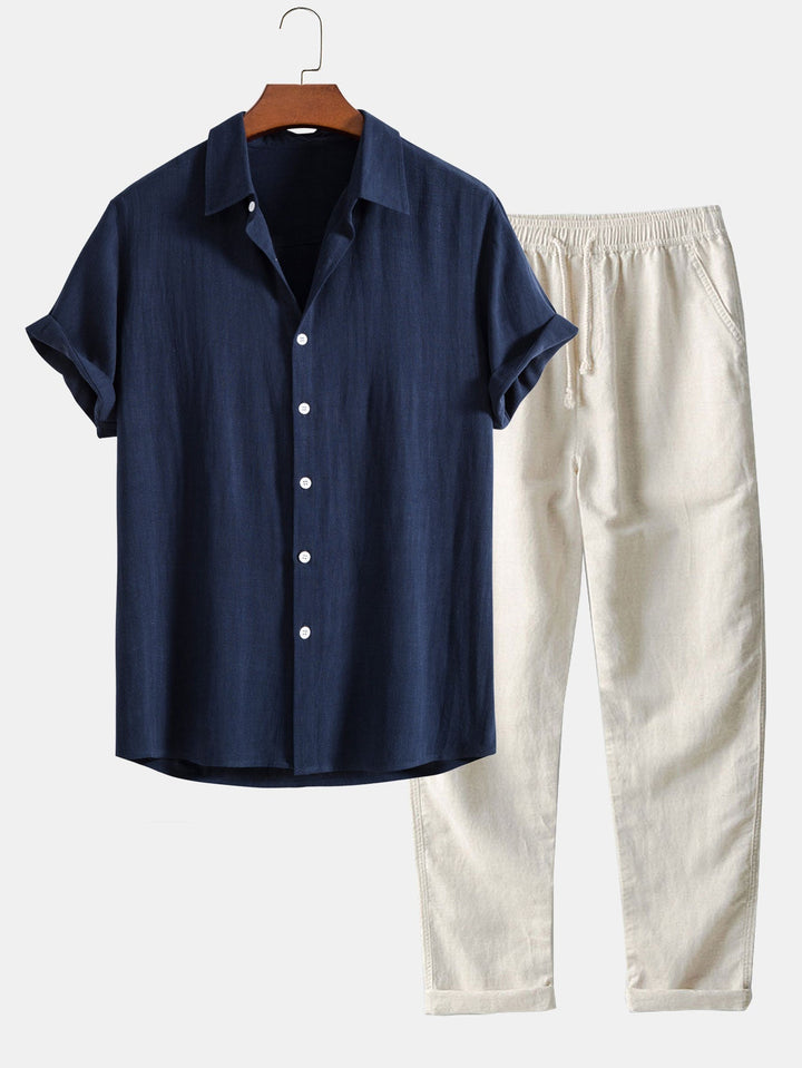 Linen blend outfit featuring a stylish button-up shirt and straight leg pants, perfect for comfortable summer casual or semi-formal wear. 0