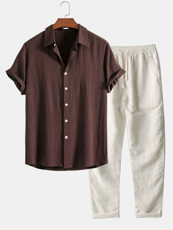 Linen blend outfit featuring a stylish button-up shirt and straight leg pants, perfect for comfortable summer casual or semi-formal wear. 1