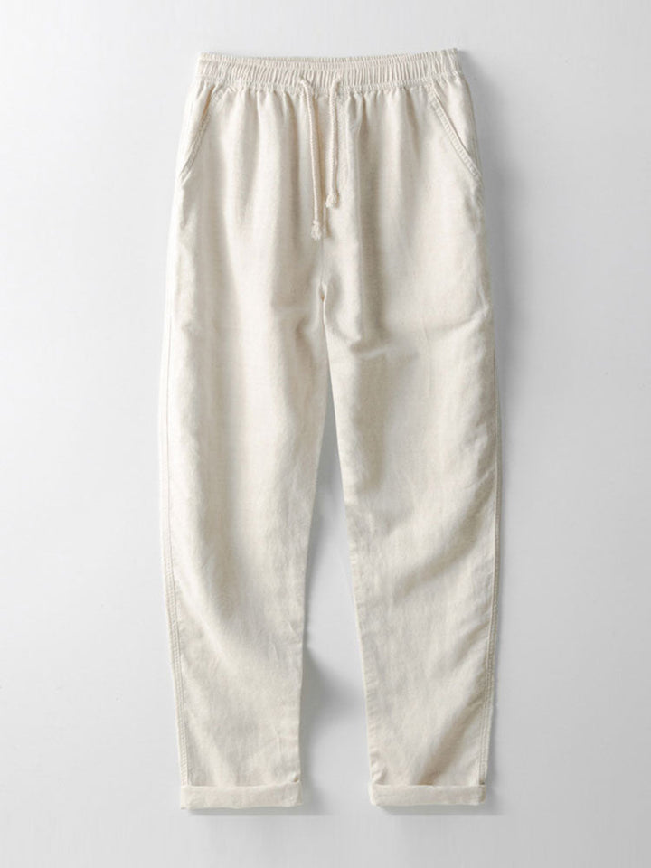 Linen blend outfit featuring a stylish button-up shirt and straight leg pants, perfect for comfortable summer casual or semi-formal wear. 5