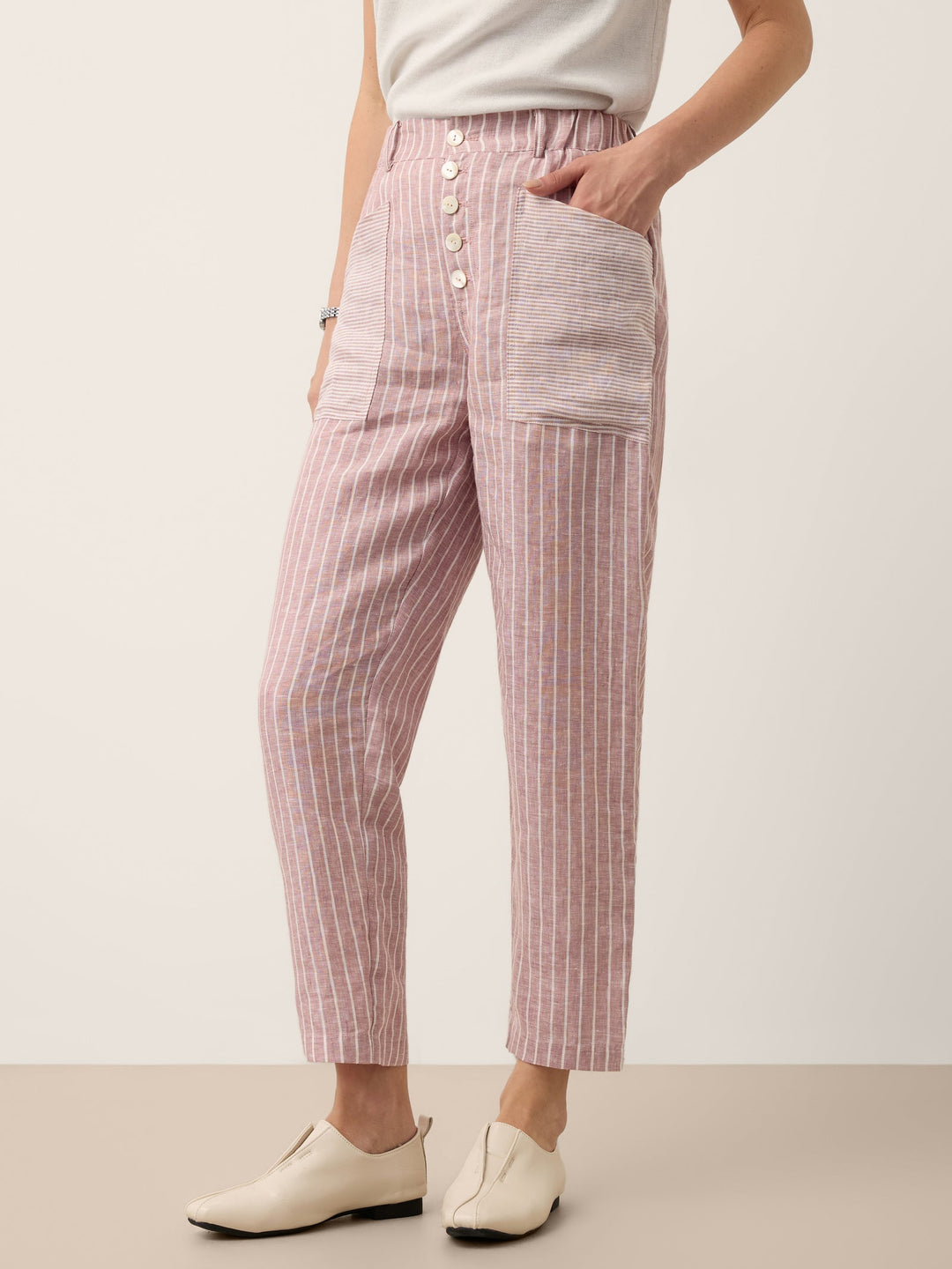 Linen pants for women featuring a tapered fit, stylish patch pockets, and a yarn-dyed striped design, crafted from 100% breathable linen for 0