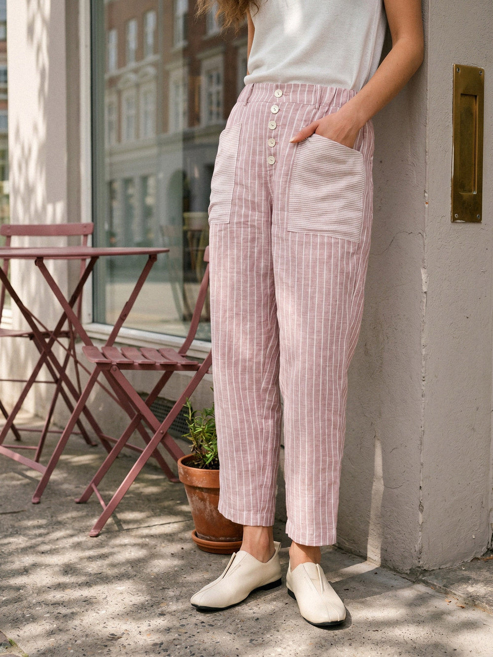 Linen pants for women featuring a tapered fit, stylish patch pockets, and a yarn-dyed striped design, crafted from 100% breathable linen for 1