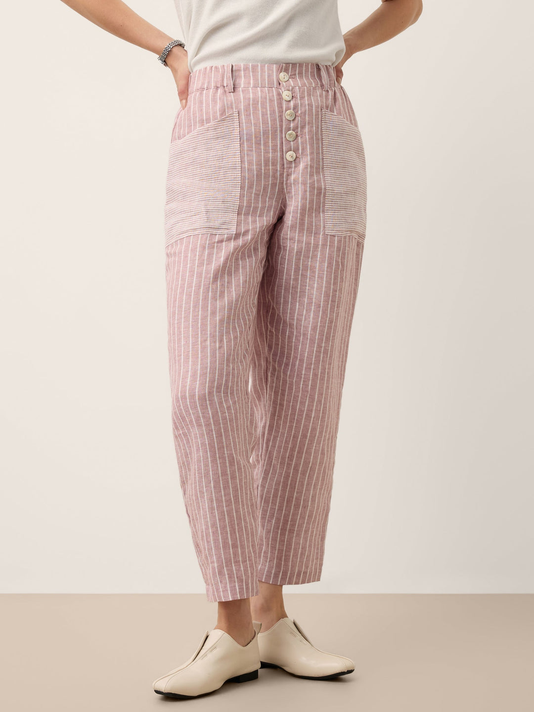 Linen pants for women featuring a tapered fit, stylish patch pockets, and a yarn-dyed striped design, crafted from 100% breathable linen for 3