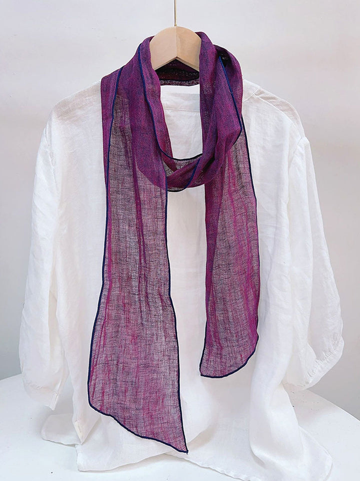 Linen scarf featuring a hand tie-dye finish in various colors, showcasing a soft and lightweight design perfect for year-round wear. 3
