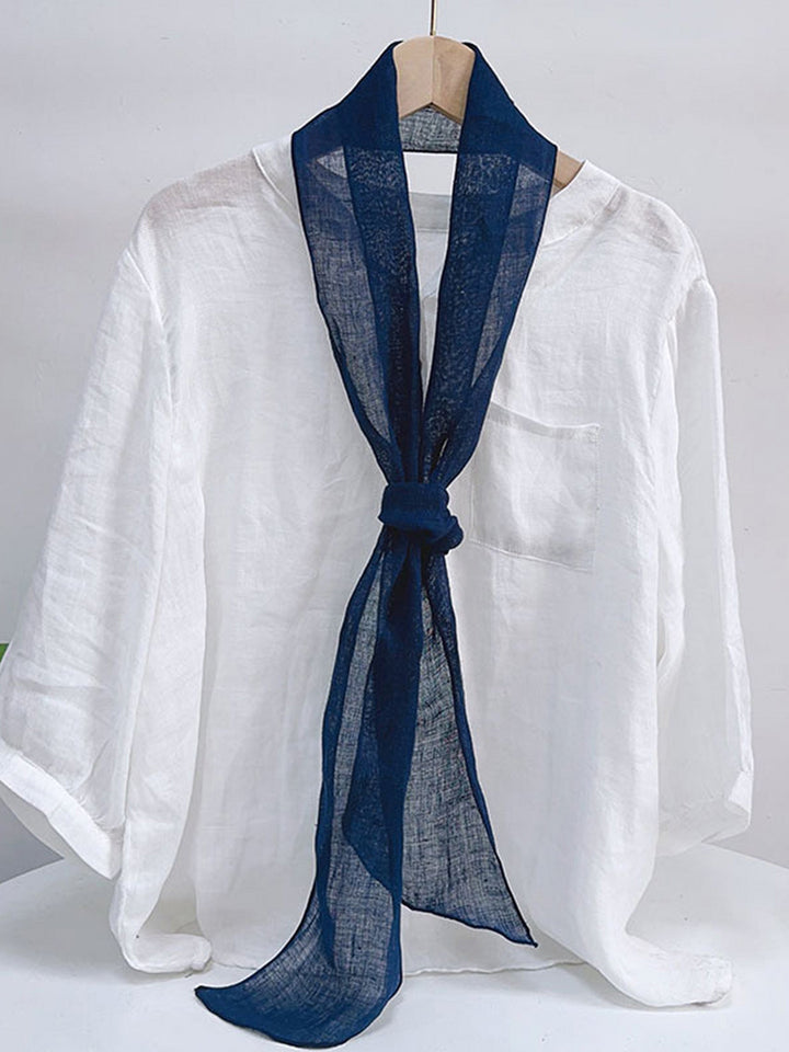 Linen scarf featuring a hand tie-dye finish in various colors, showcasing a soft and lightweight design perfect for year-round wear. 5